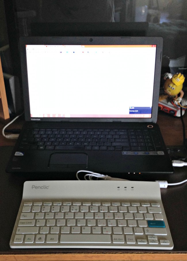 Because my laptop is plugged in I can't move it forward on my desk. The Penclic Mini Keyboard allows me to  use a keyboard without having to hunch over or reach out to touch the keys.